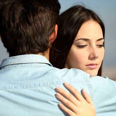 A beautiful girl is forcing her heart to love her partner